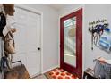 Functional entryway with storage and access to backyard at 844 Sugar House Dr, Port Orange, FL 32129