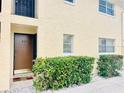 Building exterior, featuring entrance to unit 211 at 211 W San Sebastian Ct, Altamonte Springs, FL 32714