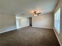 Spacious living room featuring neutral walls and carpeted floors at 2650 Sw 162Nd Ln, Ocala, FL 34473