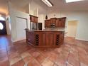 Spacious kitchen featuring a large island and stainless steel appliances at 10810 Dearden Cir, Orlando, FL 32817