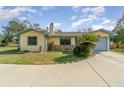 House exterior showcasing a single-story home with a landscaped yard at 16036 3Rd St, Umatilla, FL 32784