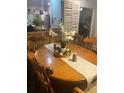 Formal dining room with a wood table and chairs at 6111 Bamboo Dr, Orlando, FL 32807