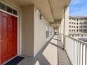 Building hallway with access to condo unit at 1211 Stonecutter Dr # 206, Celebration, FL 34747