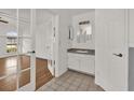 Simple bathroom with a vanity and tiled floor at 2841 Derby Dr, Deltona, FL 32738