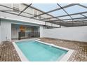 Private screened-in pool and patio area at 297 Jetty Way, Davenport, FL 33897
