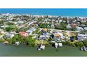 Aerial view showing home's location in a beachside neighborhood at 830 Garfish Ave, New Smyrna Beach, FL 32169