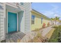 Front door and walkway of a two-story home at 906 Coral Reef Way, Daytona Beach, FL 32124