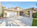 Two-car garage with a gated access to backyard at 10125 Foxhurst Ct, Orlando, FL 32836