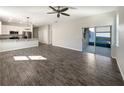 Open concept living area with tile flooring and sliding doors at 1162 Atlantic Ave, Fruitland Park, FL 34731