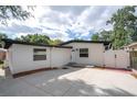 Inviting home with modern accents, fresh exterior paint, and a spacious private driveway at 2002 Geigel Ave, Orlando, FL 32806