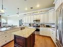 Spacious kitchen with granite countertops and stainless steel appliances at 278 Eaglet Way, Lake Mary, FL 32746