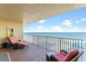 Relaxing balcony with ocean view and comfortable seating at 2901 S Atlantic Ave # 702, Daytona Beach, FL 32118