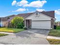 House exterior showcasing stone facade and a large driveway at 388 Westwind Ct, Lake Mary, FL 32746