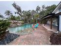 Spacious pool and patio area, perfect for entertaining at 4010 Winderlakes Dr, Orlando, FL 32835