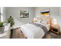 Cozy bedroom with light wood furniture and large window at 6117 Oakcrest Cir, Orlando, FL 32808