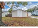 View of front yard with a well maintained yard with a blue sky background at 2235 Ginger Way, Lakeland, FL 33801