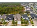 Aerial view of a house and surrounding homes at 4220 Cleary Way, Orlando, FL 32828