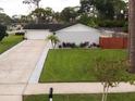 Single story home with a two car garage and nicely landscaped yard at 884 Great Bend Rd, Altamonte Springs, FL 32714