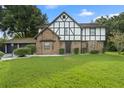 Two-story brick home with a charming facade at 2540 Albany Dr, Kissimmee, FL 34758