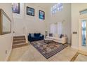 Spacious living room with high ceilings and tiled floors at 2556 Antlia Dr, Orlando, FL 32828