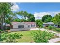 Charming single story home with a well-manicured lawn at 767 Trailwood Dr, Altamonte Springs, FL 32714