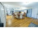 Cozy kitchen with light blue cabinets and a breakfast bar at 883 Montrose Ave, Orange City, FL 32763