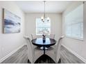 Casual breakfast nook with round table and four chairs at 8886 Fallen Oak Dr, Davenport, FL 33896