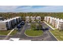 Complex of modern townhomes with parking and green space at 9029 Ibiza Ln # 1, Kissimmee, FL 34747