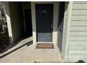 Exterior condo entrance with two doors at 6034 Westgate Dr # 202, Orlando, FL 32835