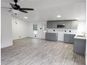 Modern gray kitchen with new appliances and flooring at 6952 Sw 85Th Pl, Ocala, FL 34476