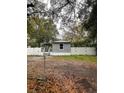 Mobile home exterior with covered porch and fenced yard at 9868 6Th Ave, Orlando, FL 32824