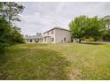 An expansive backyard offers ample space for recreation and relaxation at 1010 Embrun Ct, Kissimmee, FL 34759