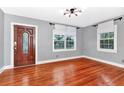 Living room with hardwood floors and lots of natural light at 1300 E Kaley St, Orlando, FL 32806