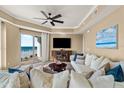 Bright living room with ocean views and comfy seating at 2855 S Atlantic Ave # 304, Daytona Beach Shores, FL 32118