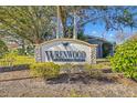 Wrenwood Condominiums sign, welcoming residents and guests at 4952 Tangerine Ave # 4952, Winter Park, FL 32792