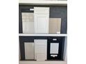 Selection of kitchen cabinets, backsplash and flooring options at 5182 Gardenrow Dr, St Cloud, FL 34772