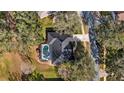 Property features a private pool and backyard oasis at 8835 Spyglass Loop, Clermont, FL 34711