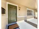 Charming front door with decorative details and a welcoming porch light at 2207 Winter Woods Blvd, Winter Park, FL 32792