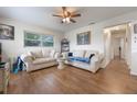 Bright living room featuring hardwood floors and comfy seating at 2914 Sprague Dr, Orlando, FL 32826