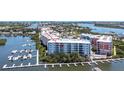 Aerial view of a waterfront condo building, highlighting a specific unit at 3 Riverwalk Dr # 405, New Smyrna Beach, FL 32169