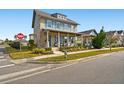 Two-story house with blue shutters and landscaped yard at 9203 Neher St, Orlando, FL 32827