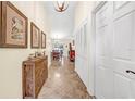 Bright entryway with tile flooring and built-in storage at 1426 Spring Ridge Dr, Winter Garden, FL 34787