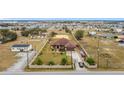 Aerial view of a house, showing the property and neighborhood at 1719 North W Blvd, Davenport, FL 33837