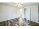 Bright bedroom with wood-look floors and spacious closet at 277 Debary Dr, Debary, FL 32713