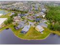 Aerial view of home and community, highlighting location and landscape at 14020 Bradbury Rd, Orlando, FL 32828