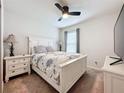 Guest bedroom with white furniture and window coverings at 1623 Aspen Ave, Davenport, FL 33837