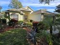 Charming house with landscaping and a two-car garage at 3840 Eversholt St, Clermont, FL 34711