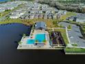 Resort-style pool and playground with lakefront views at 609 Bayhawk St, Debary, FL 32713