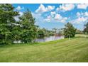 Peaceful community with a lake and lush green areas at 8981 Lee Vista Blvd # 2209, Orlando, FL 32829