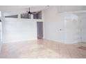 Open living room with tile flooring and high ceilings at 2319 Island Club Way, Orlando, FL 32822